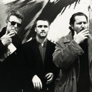David Bowie, Damien Hirst, Julian Schnabel, New York. 1996 by Roxanne Lowit, three men smoking