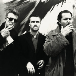 David Bowie, Damien Hirst, Julian Schnabel, New York. 1996 by Roxanne Lowit, three men smoking