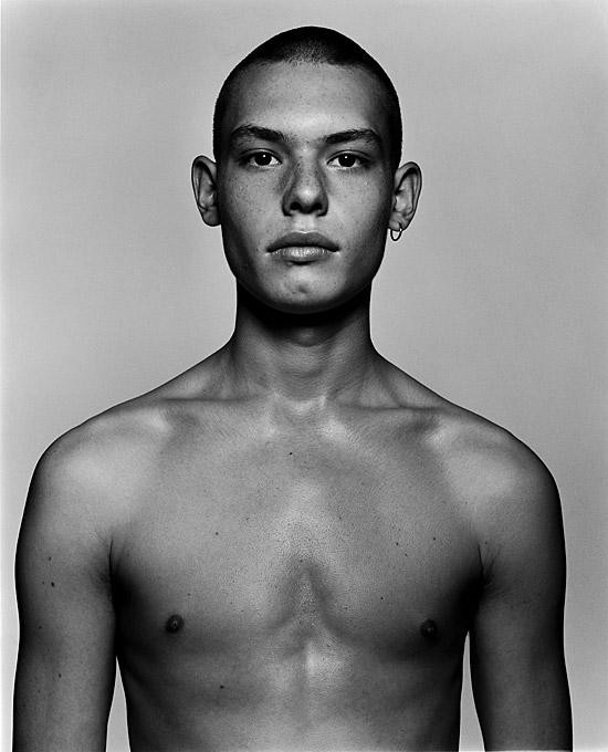 Sebastian Breeding by Rankin, black and white portrait of nude male model with and earring