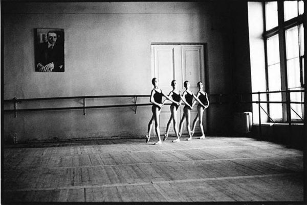 Vaganova School, St. Petersburg (Four Dancers Holding Hands), 1999 by Arthur Elgort, four ballerinas dancing in a practice room