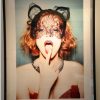 meow, jessica chastain by Ellen von Unwerth, portrait of the actress in a lace cat mask and pink lip, open mouth framed black