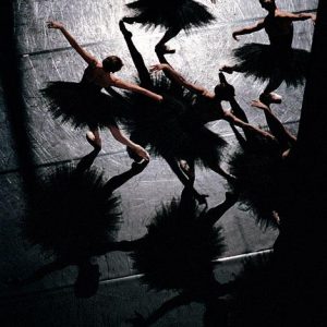 Etudes de Harald Lander ballet de l Opera National de Paris by Gérard Uféras, Ballerinas in black tutus in bright spotlight on stage