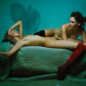 Comte_Rizzoli Nudes. 1998 by Michel Comte, two nude models in stockings lying on a green bed