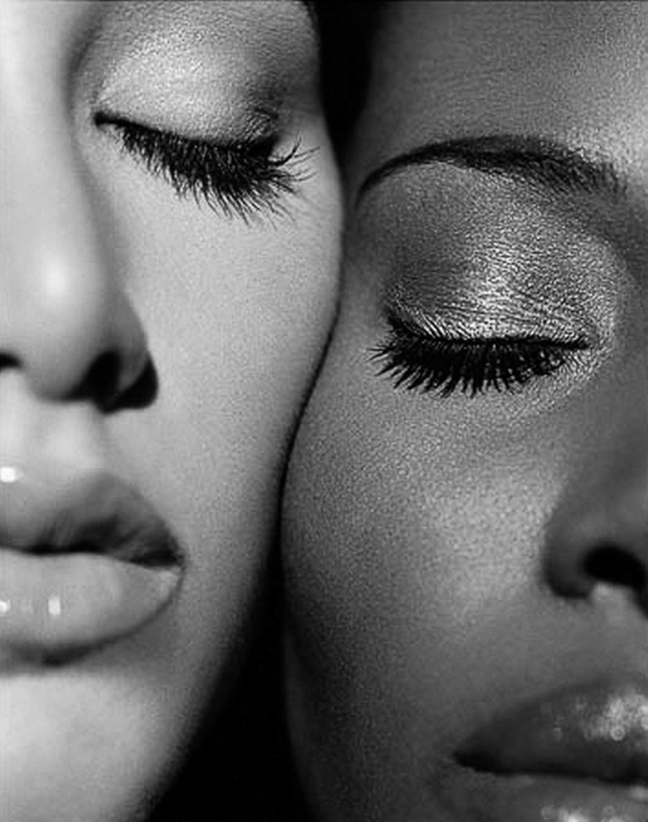 Carlota and N'Gone by Bruno Bisang, closeup portrait of two models pressing their faces together