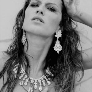 Gisele Bündchen by Michel Comte, black and white Portrait of the Model with wet hair wearing diamond jewellry