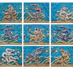 Dragon Series, Set of photograph in 9 panels by Liu Bolin, person painted to match the background infront of different dragons painted on a blue wall
