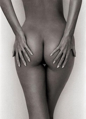 Philippa, Santorini 1995 by Andreas H. Bitesnich, closeup of nude grabbing her butt