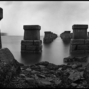bridge footings by Mark Seliger, stone pillars in Water