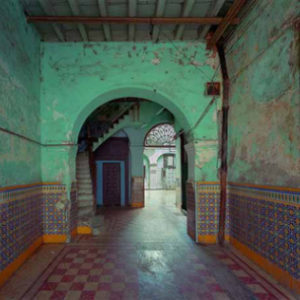 221 Calle Cuba, Havana Vieja, Cuba. 1997 by Robert Polidorim interor of an old house with colorful tiles and green walls