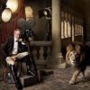 Steven Spielberg and Lion by Mark Seliger, the director in an antique architecture between film equipment, next to a lion