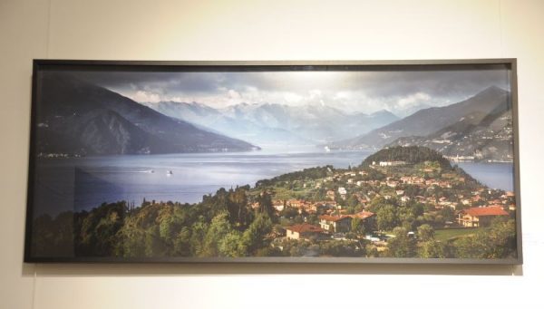 Escape to Lake Como by David Drebin, landscape of the lake with surrounding mountains and villages, framed black