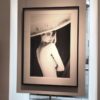 Claudia Schiffer, Parasol by Ellen von Unwerth, portrait of the nude model looking back over her shoulder