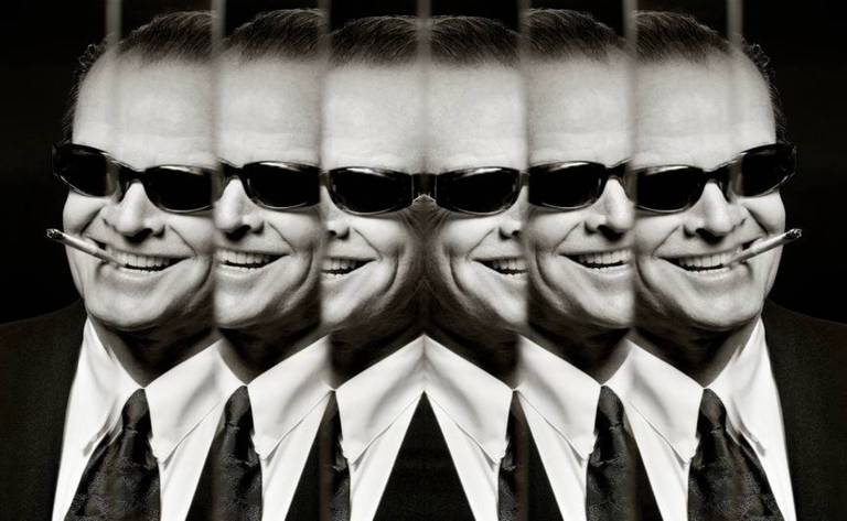 Jack Nicholson by Albert Watson, portrait of the actor in suit with sungalsses and cigarette, through several mirrors