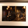 Steven Spielberg and Lion by Mark Seliger, the director in an antique architecture between film equipment, next to a lion, framed black