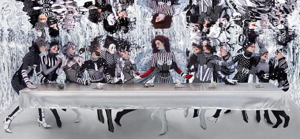 The Last Supper Underwater, 2005 by Howard Schatz, recreation of DaVincis last supper with models in black and white clown costumes, underwater