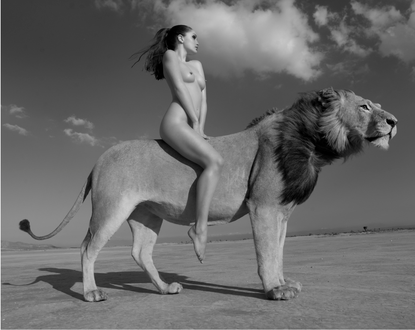 Angela rides the lion
