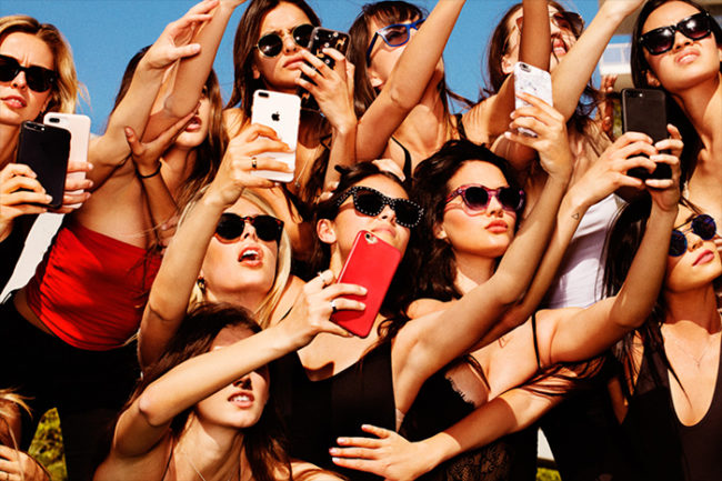 Model Nation by Tony Kelly, a group of models in sunglasses, each taking a selfie