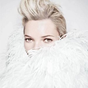Furry Kate with Quff, 2011 by Rankin, portrait of the model in white feather boa