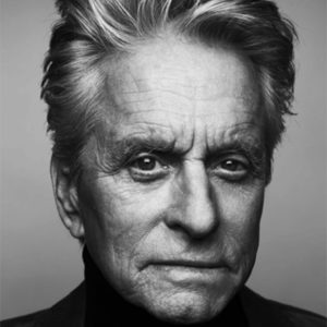 Michael Douglas by Nigel Parry, black and white portait of the actor in a black turtleneck
