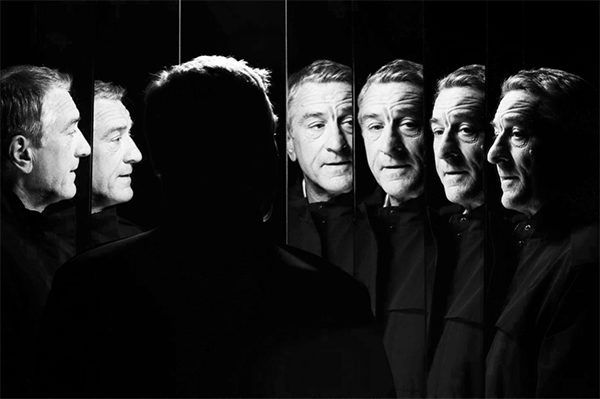 Robert De Niro by Nigel Parry, the actor looking into several mirrors