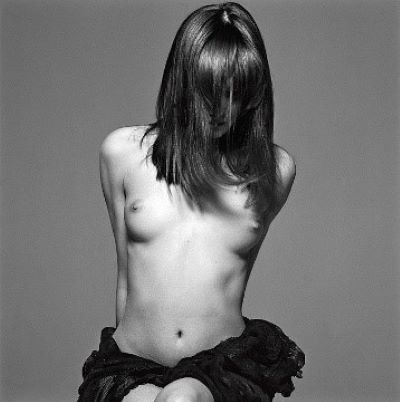 Carla Bruni, Safe Sex Campaign 1993, the nude musician sitting, her hair covering her face