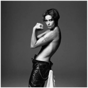 Demi Moore by Michel Comte, portrait of the actress in short hair and leather pants