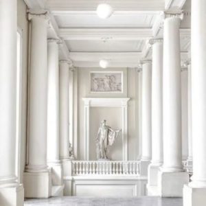 Academia delle belle, by Massimo Listri, white porticus and marble apollo statue