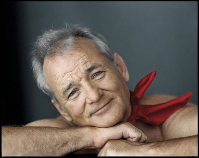 Bill Murray by Mark Seliger portrait of the actor wearing a red bandana around his nack, leaning his head on his arms