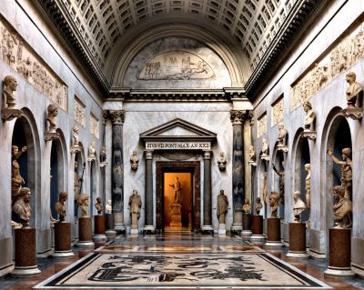 Brazio Nuovo by Massimo Listri, hall with casetted barrel vault and faux arcades holding marble statues