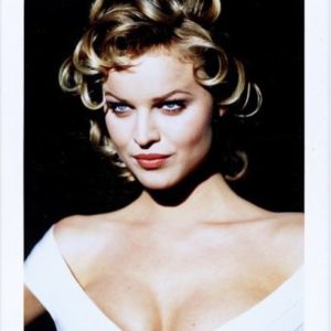 Eva Herzigova, Paris 1993 by bruo Bisang, portrait of the model in blonde curls and white dress