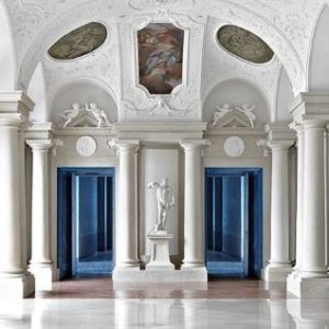 Palazzo Liechtenstein by Massimo Listri, white baroque interiorwith stucco and ceiling fresco