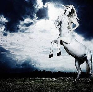 Centaur II by Rankin, white centaur with girl body in front og a stormy sky