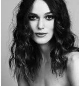 Keira Knightley, London by Roxanne Lowit, black and white portrait of the actress in dark curls