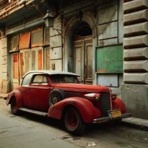 Vintage Car with Compsite Parts by Robert Polidori, red car in front of old fassade