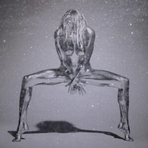 Silvereye Diamonddust by Guido Argentini, silver painted model in godess pose, covering herself with her hands