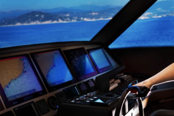 Steering Ship by David Drebin, womans leg in black heel on a ships steering wheel, a bay in the background