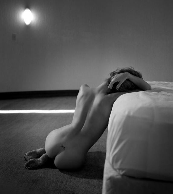Guido Argentini - Dare to see things your way, nude model leaning on a bed