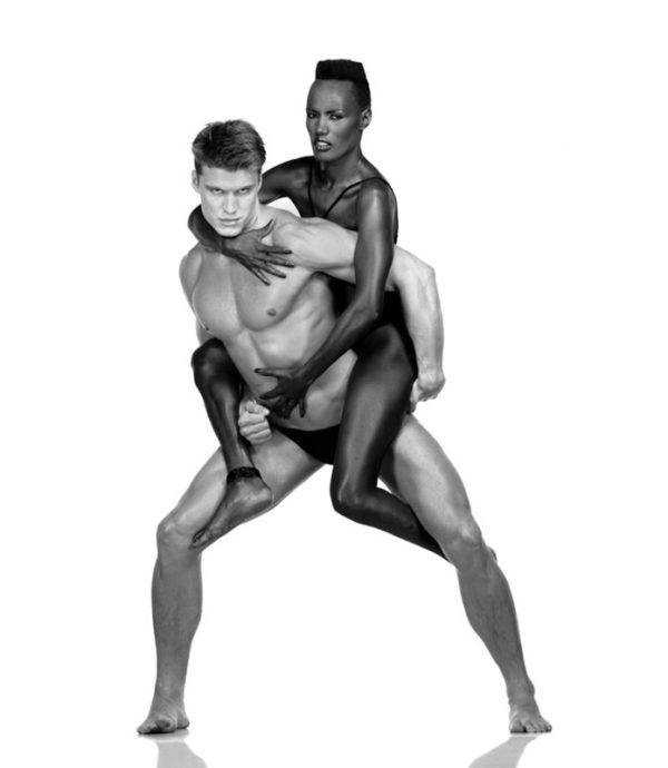 Grace Jones and Dolph Lundgren - New York 1983 by Albert watson black model piggyback riding a male model