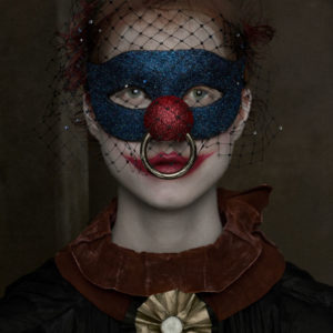 Julie - New York City 2017 by ALbert Watson, model in blue glittermasl with clownnose with septum piercing, clownmakeup and veil