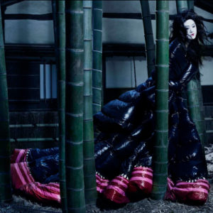 Kiko Arai - Vogue Japan - Japan 2019 by ALbert Watson, model in black and pink puffer gown between bamboo stems