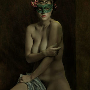 Myla - NYC 2017 by Albert Watson, nude model in a green mask with pink flowers in her hair, holding a striped piece of fabric