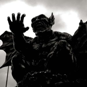 Deeper Shades of Vienna 9 by Andreas H. Bitesnich, black and white, high contrast picture of a gargoyle figure in the viennese prater