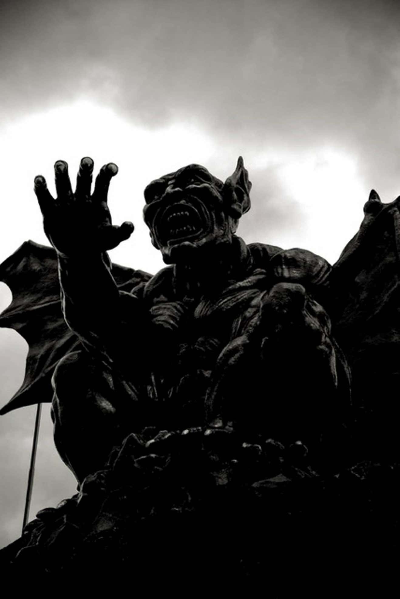 Deeper Shades of Vienna 9 by Andreas H. Bitesnich, black and white, high contrast picture of a gargoyle figure in the viennese prater