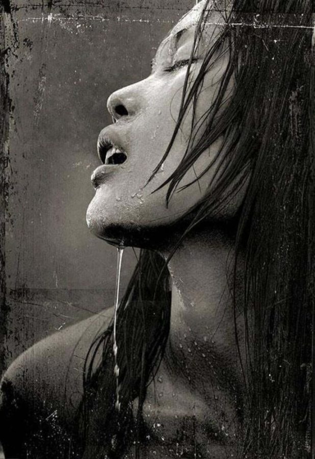Erotic Nude 2010 #6017 by Andreas H. Bitesnich, black and white side profile of a model with water dripping down her face