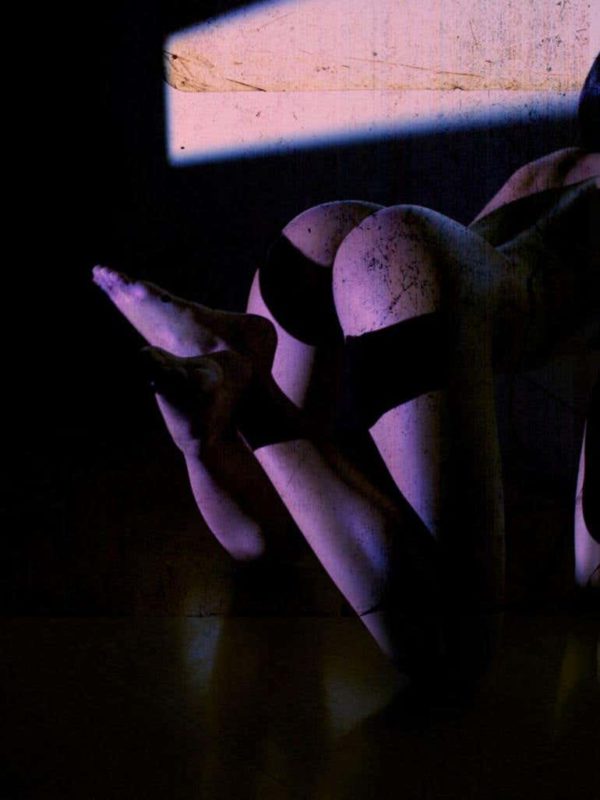 Erotic Nude #3781 by Andreas H. Bitesnich, nude model on all fours in violet light