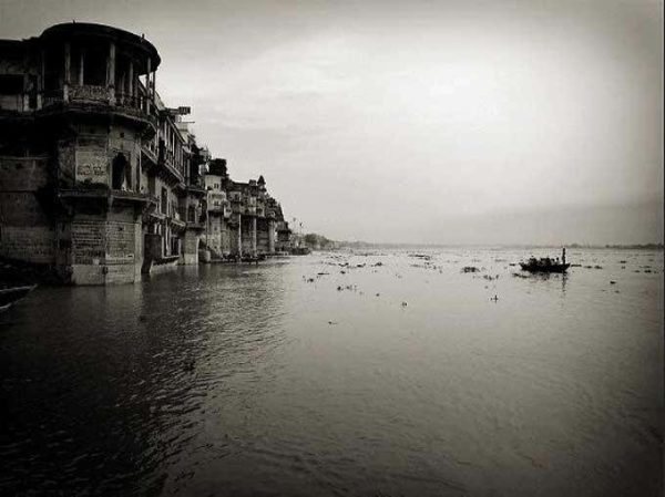 Ganges Varanasi by Andreas H. Bitesnich, houses built into the water