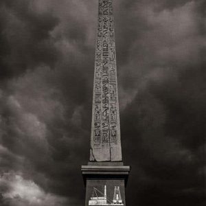 Paris by Andreas H. Bitesnich, the Obélisques de Louxor under a cloudy sky
