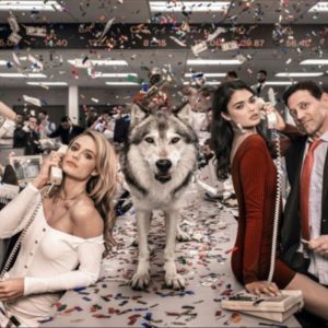 The wolves of wall street color by David Yarrow, party scene in a wallstreet office with a wolf standing on the table looking at the camera