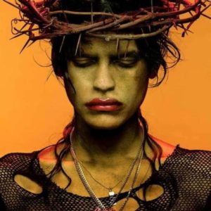 Omahyra by Albert Watson, portrait of the model wearing a crown of thorns