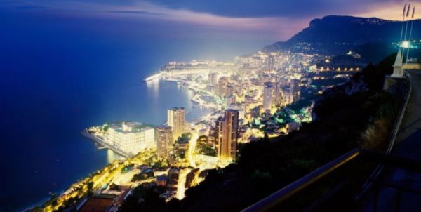 City of gold by David Drebin, Monte Carlo by night with glowing lights and the ocean